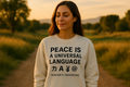 PEACE IS A UNIVERSAL LANGUAGE Long Sleeve